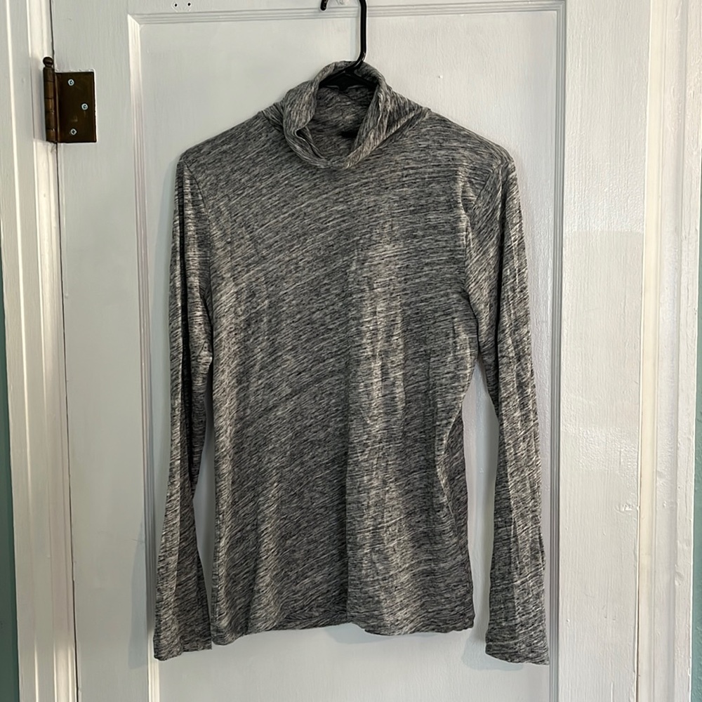 Lightweight gray turtle neck shirt.